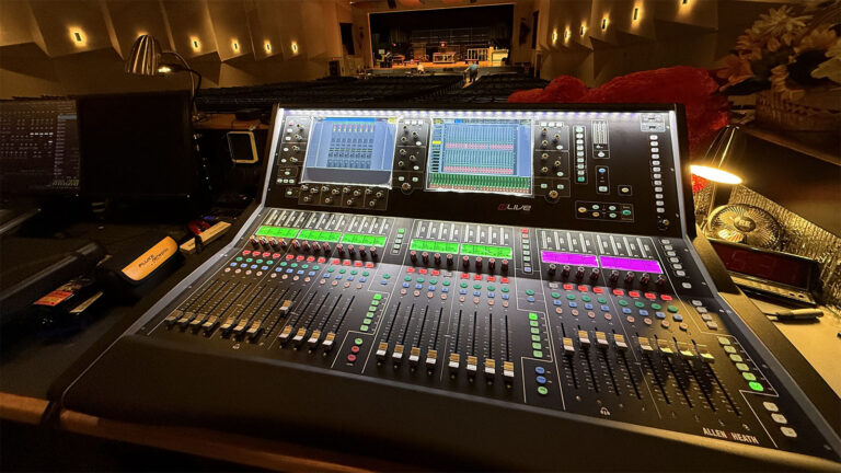 Digital mixing console at front of house during event production